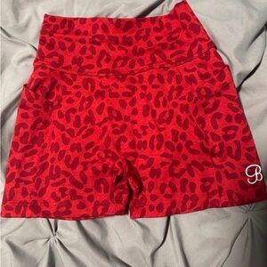BOMBSHELL SPORTSWEAR Red cheetah Women's High Waist Shorts